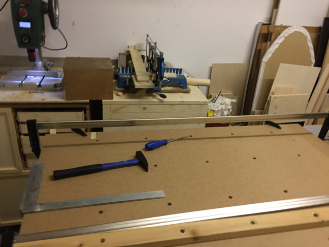 The holes for the clamping grid.